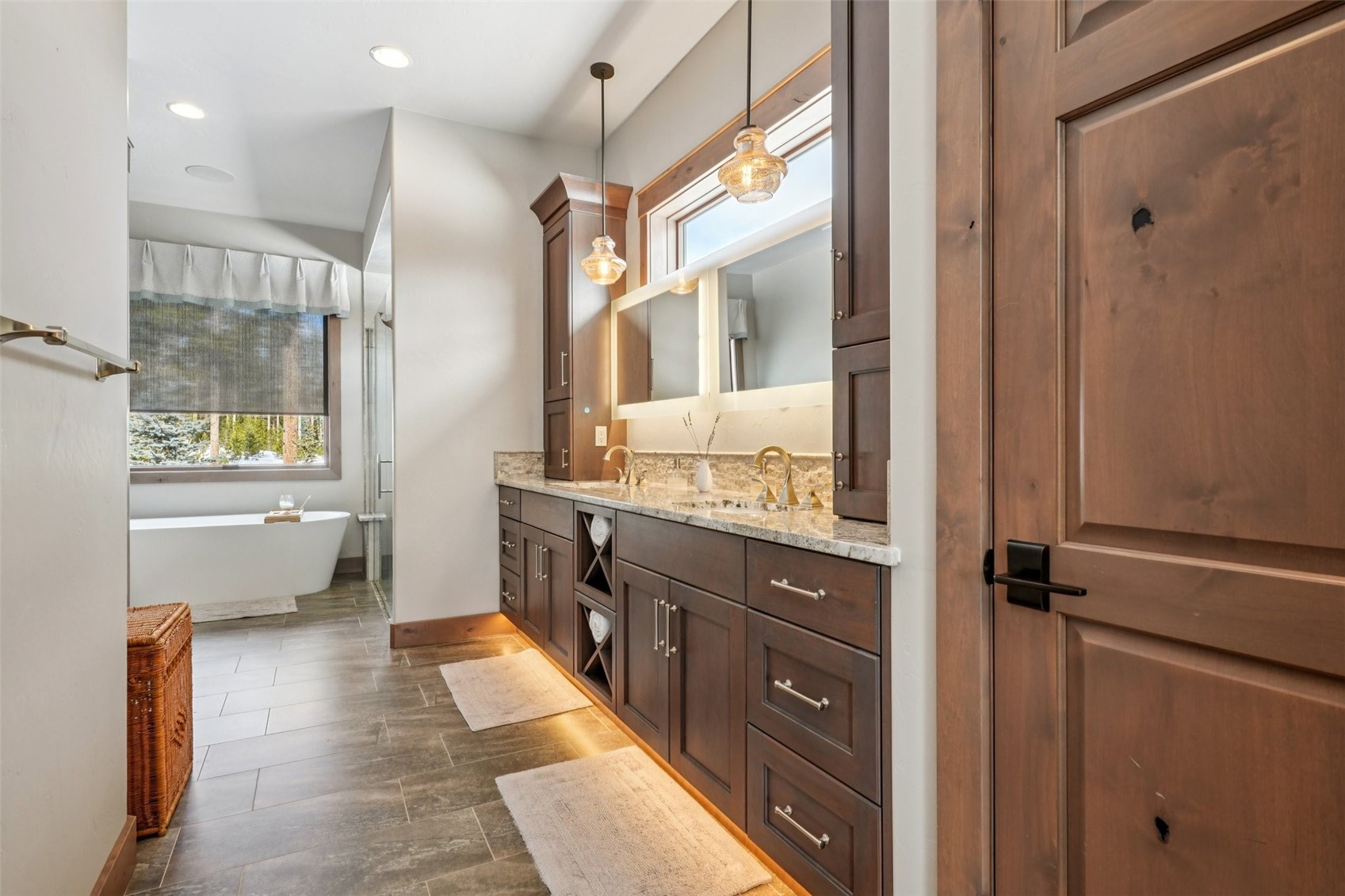60 Barton Ridge Drive Breckenridge, CO 80424 - Photo 25 of 50 Full bathroom featuring healthy amount of natural light, double vanity, a soaking tub, recessed lighting, and wood tiled floors