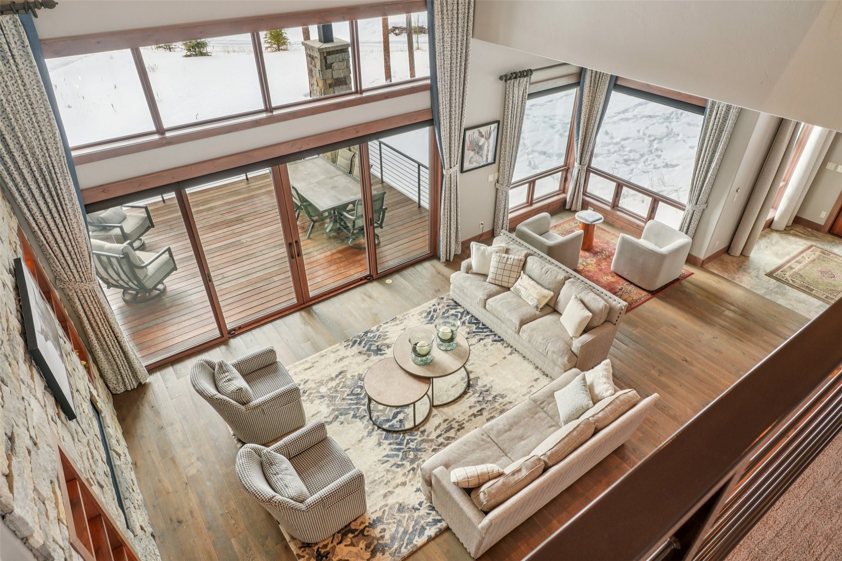 60 Barton Ridge Drive Breckenridge, CO 80424 - Photo 30 of 50 Living room featuring a high ceiling and wood-type flooring