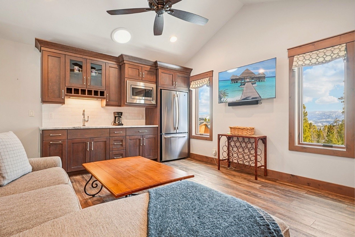 60 Barton Ridge Drive Breckenridge, CO 80424 - Photo 39 of 50 a living room with furniture and a wooden floor