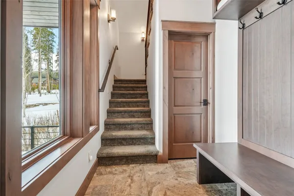 a living room with stainless steel appliances kitchen island granite countertop furniture and a kitchen view