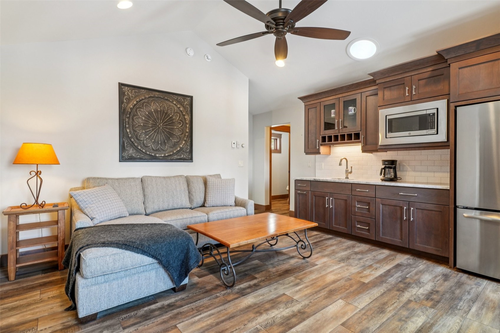 60 Barton Ridge Drive Breckenridge, CO 80424 - Photo 44 of 50 Living room featuring ceiling fan and light wood-type flooring