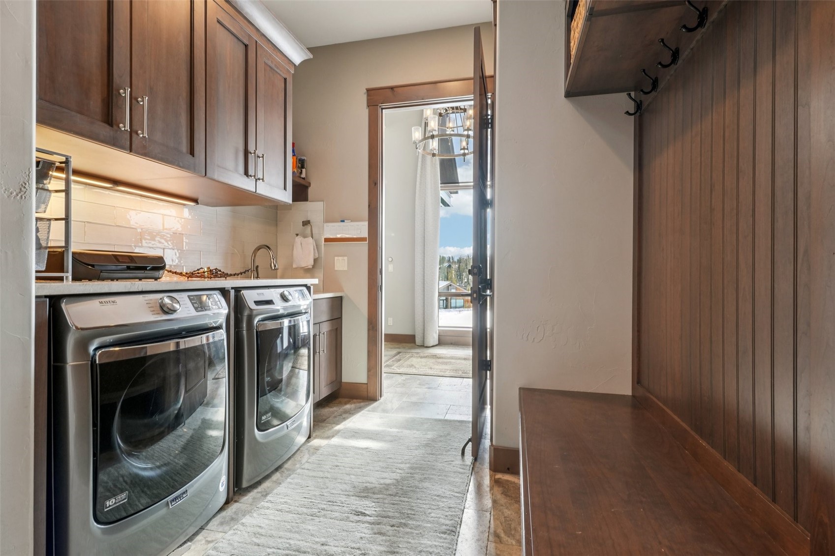 60 Barton Ridge Drive Breckenridge, CO 80424 - Photo 48 of 50 Laundry room with cabinet space and washer and clothes dryer
