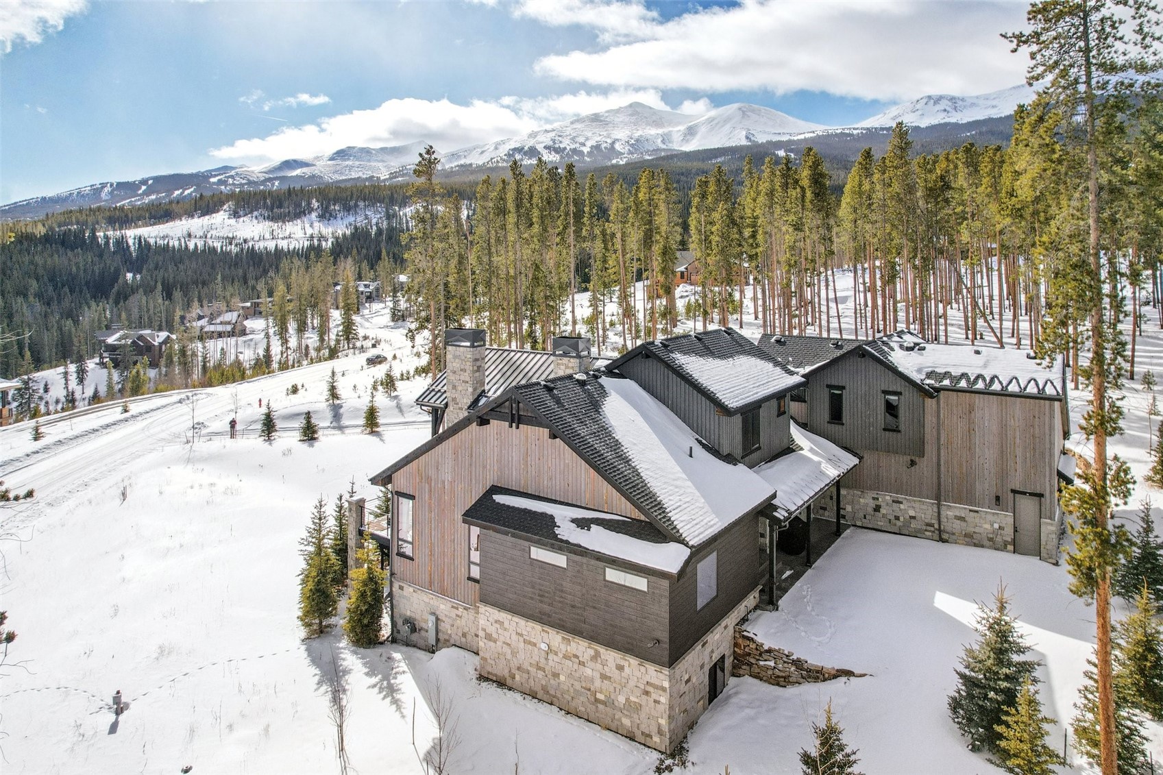 60 Barton Ridge Drive Breckenridge, CO 80424 - Photo 50 of 50 Snowy aerial view featuring a mountain view