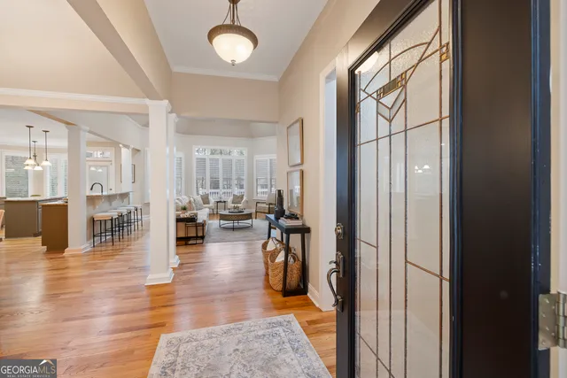 a view of a living room and hardwood floor