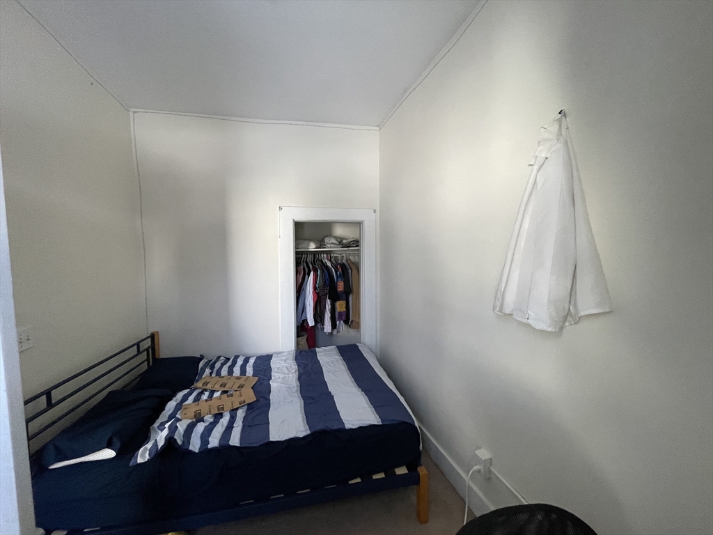 11 Seckel Street, Unit 1 Cambridge, MA 02141 - Photo 11 of 21 a room with furniture and a table