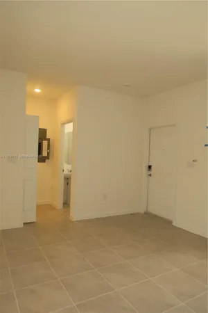 view of an empty room with a window