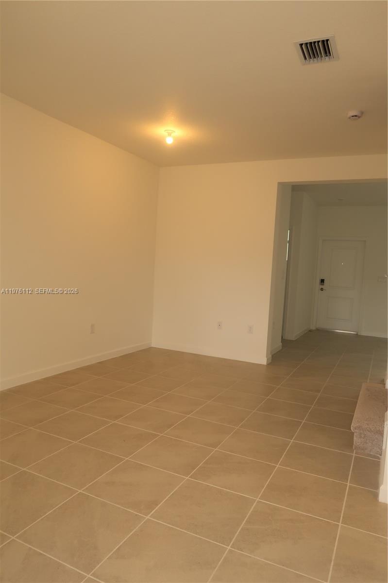 1509 Southeast 27th Street Homestead, FL 33035 - Photo 23 of 27 a view of an empty room