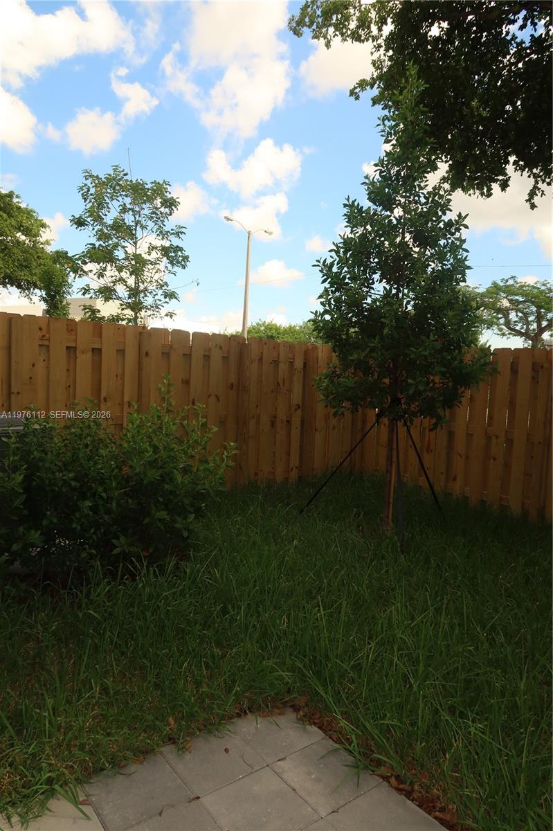 1509 Southeast 27th Street Homestead, FL 33035 - Photo 24 of 27 a view of backyard with green space