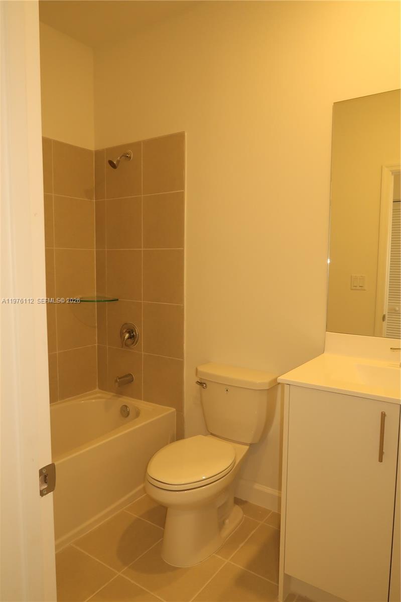1509 Southeast 27th Street Homestead, FL 33035 - Photo 9 of 27 a bathroom with a toilet and a shower