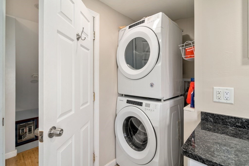 83 Cedar Street Wakefield, MA 01880 - Photo 11 of 36 a utility room with dryer and washer
