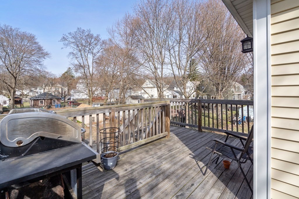 83 Cedar Street Wakefield, MA 01880 - Photo 21 of 36 a view of balcony with wooden floor