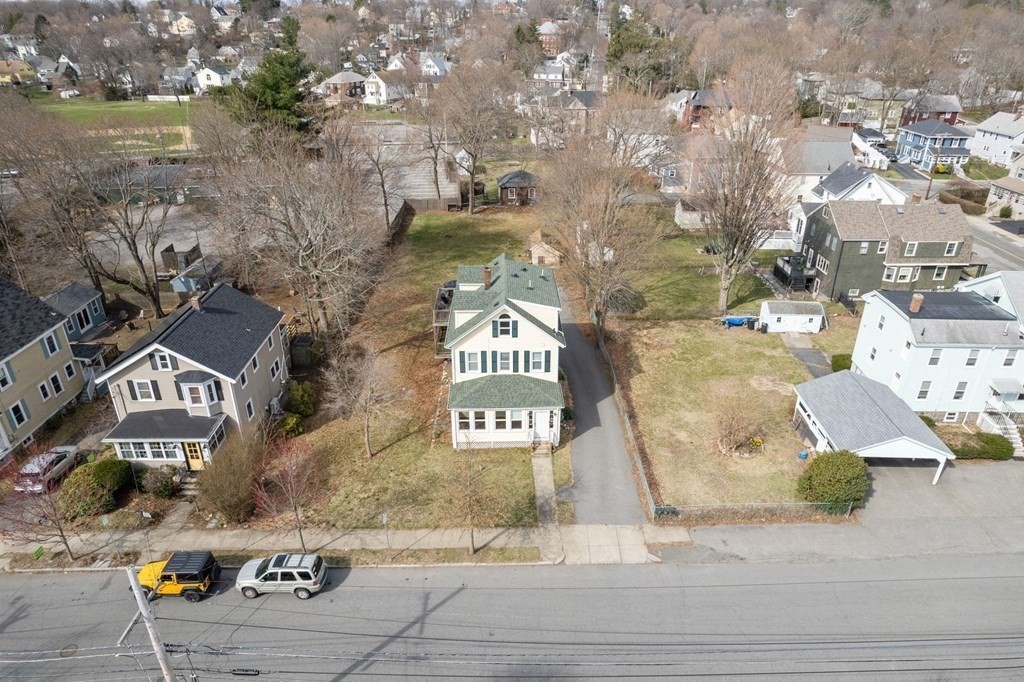 83 Cedar Street Wakefield, MA 01880 - Photo 30 of 36 a view of a street with houses