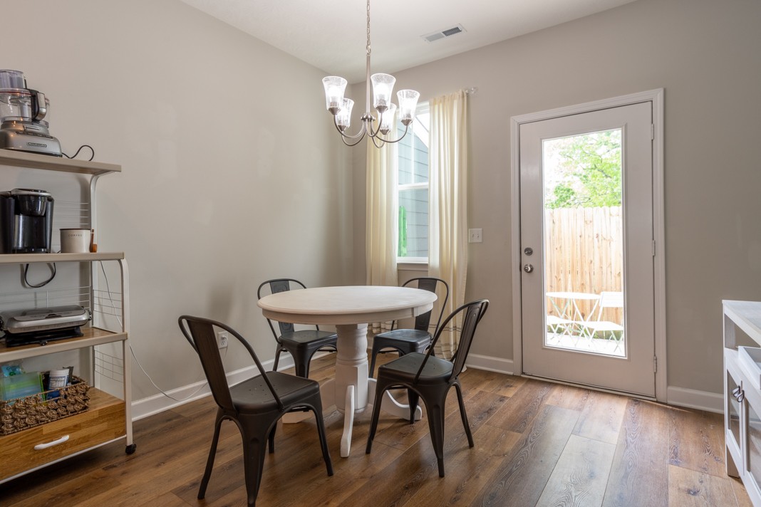 1382 Rural Hill Road, Unit 316 Antioch, TN 37013 - Photo 11 of 23 a view of a dining room with furniture window and wooden floor