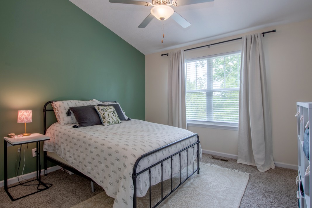 1382 Rural Hill Road, Unit 316 Antioch, TN 37013 - Photo 12 of 23 a bedroom with a bed and a window
