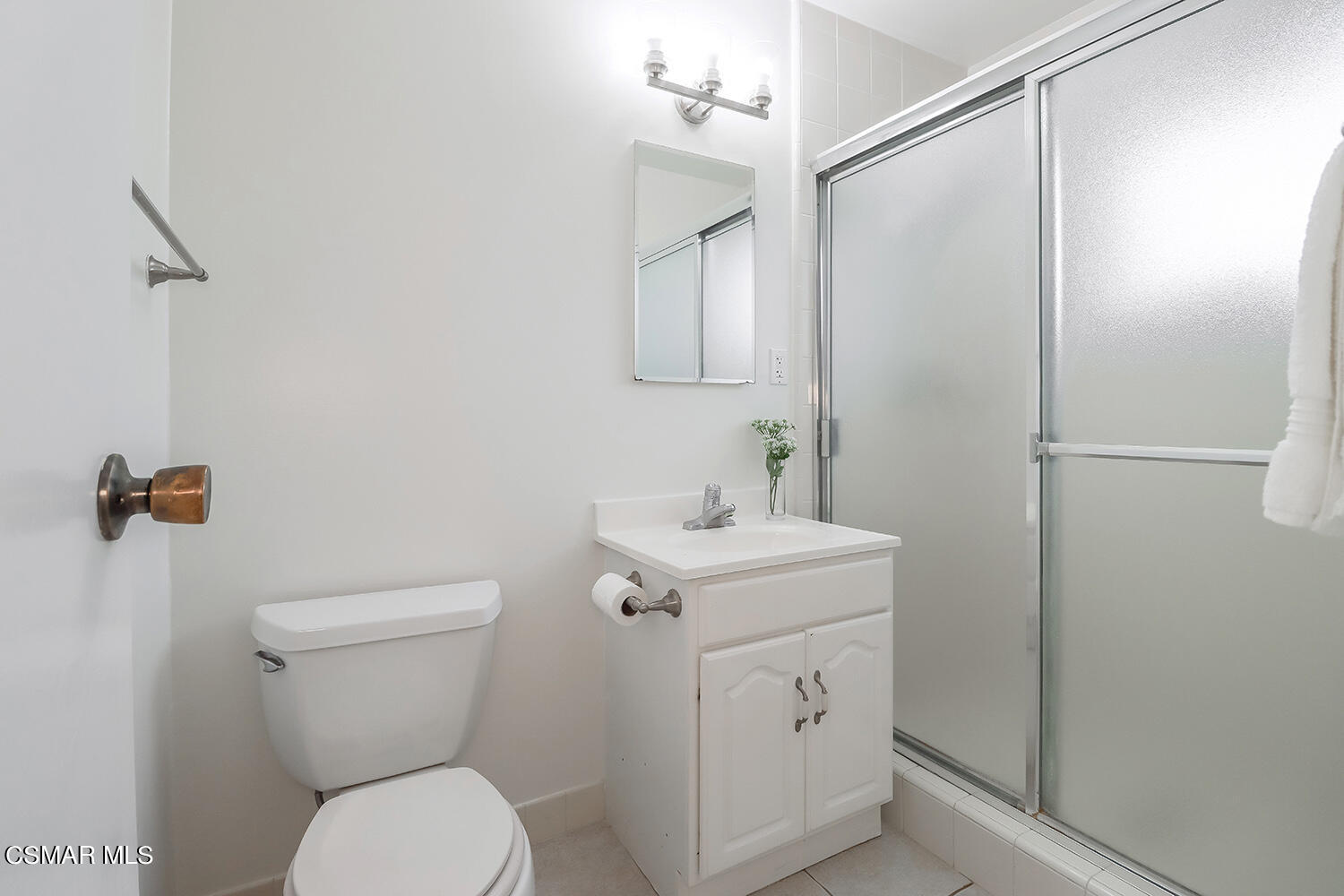 1870 Burch Avenue Simi Valley, CA 93063 - Photo 13 of 20 a bathroom with a toilet sink and mirror