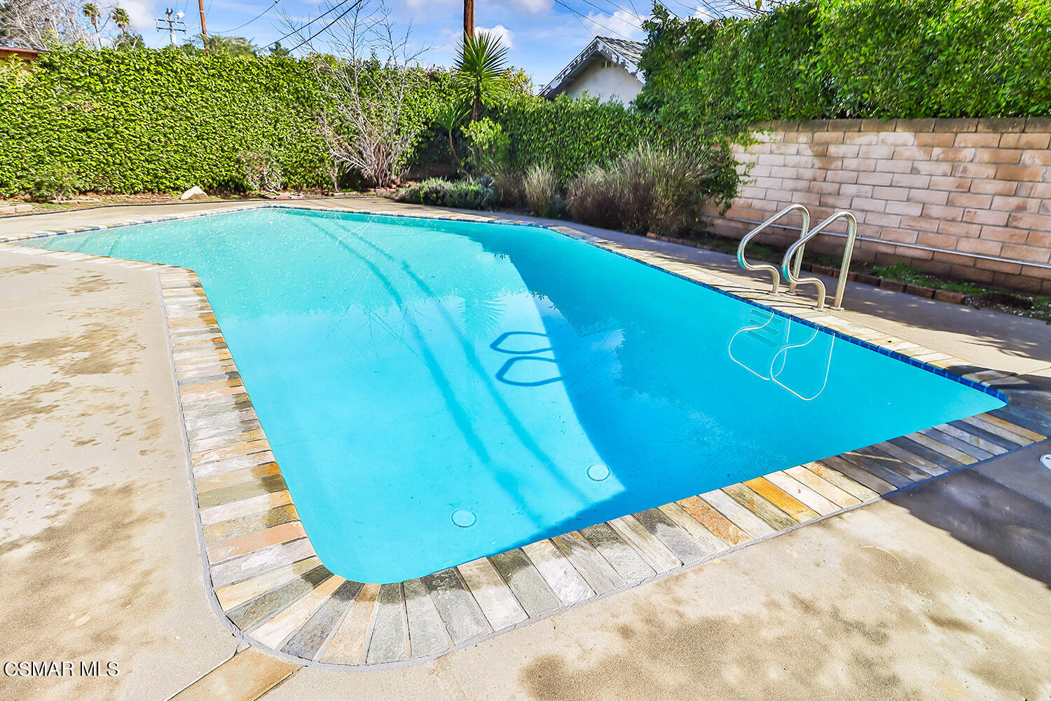 1870 Burch Avenue Simi Valley, CA 93063 - Photo 18 of 20 a view of a swimming pool with a yard