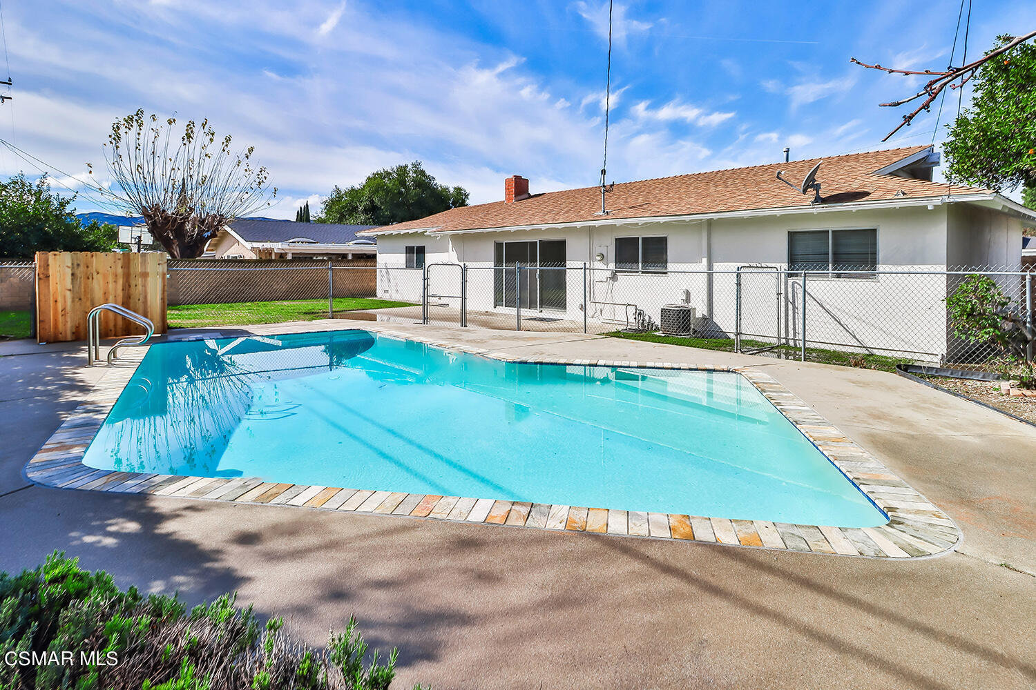 1870 Burch Avenue Simi Valley, CA 93063 - Photo 19 of 20 a view of a house with backyard sitting area and swimming pool