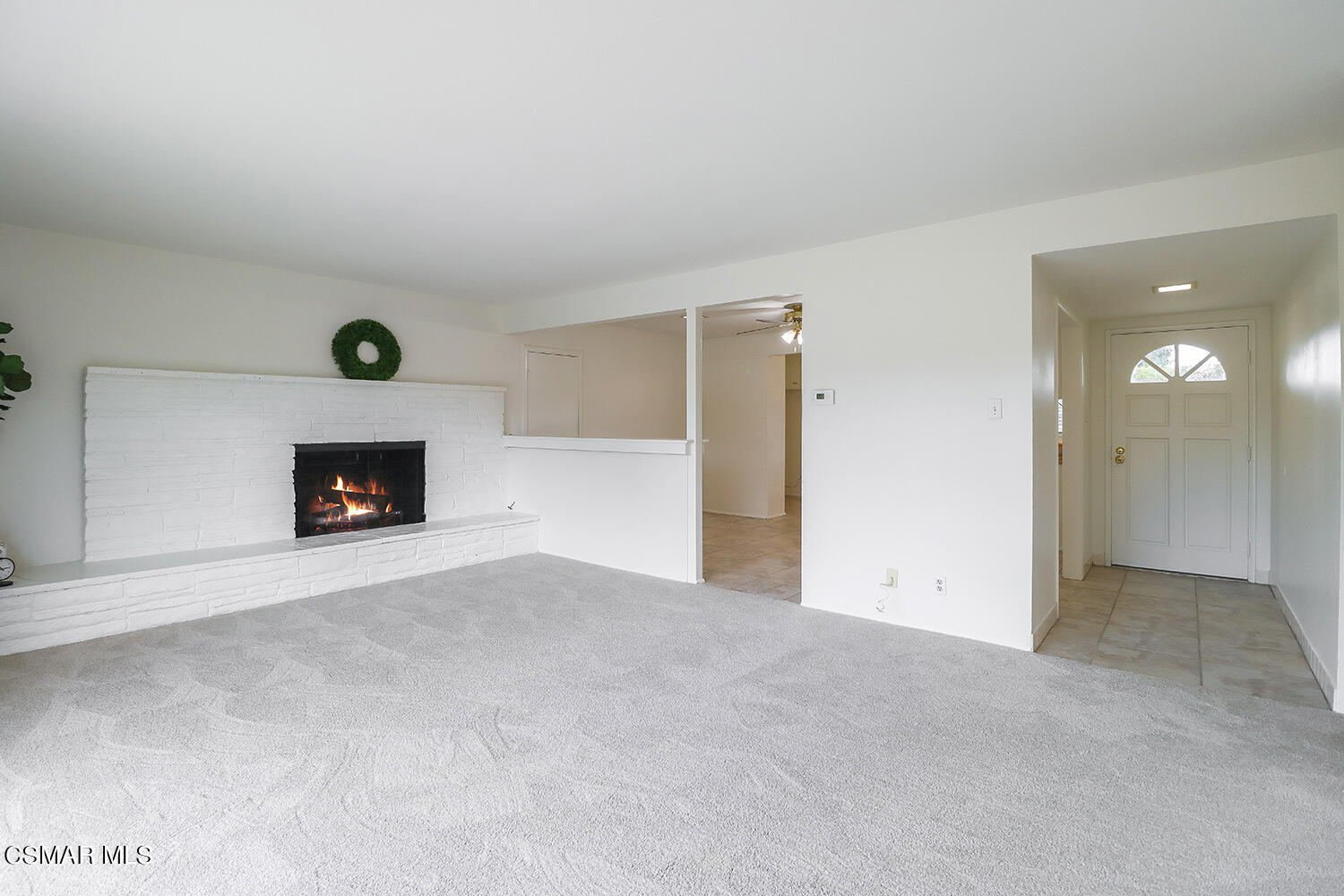 1870 Burch Avenue Simi Valley, CA 93063 - Photo 4 of 20 a view of an empty room with a fireplace