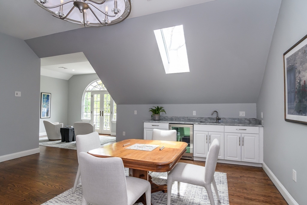 1098 Webster Street Needham, MA 02492 - Photo 10 of 21 a dining room with furniture a rug and wooden floor