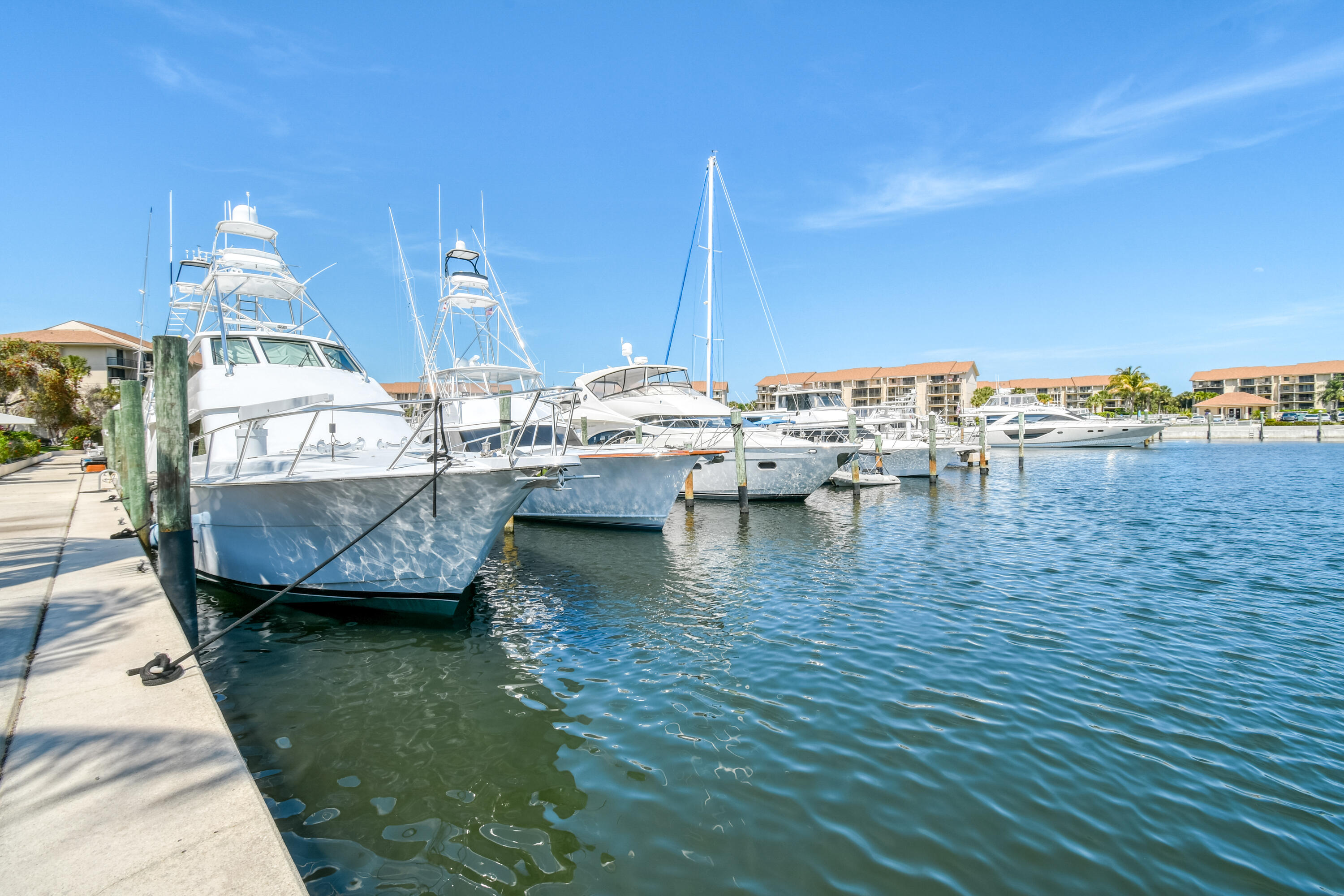 2401 Marina Isle Way, Unit 503 Jupiter, FL 33477 - Photo 41 of 46 a view of a lake with boats in front of house