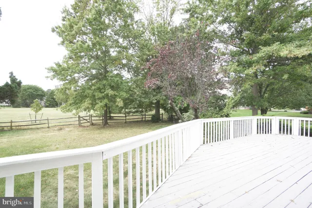 a view of a swimming pool with an outdoor space