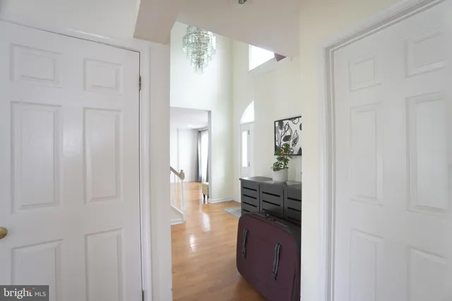 a view of a kitchen from the hallway