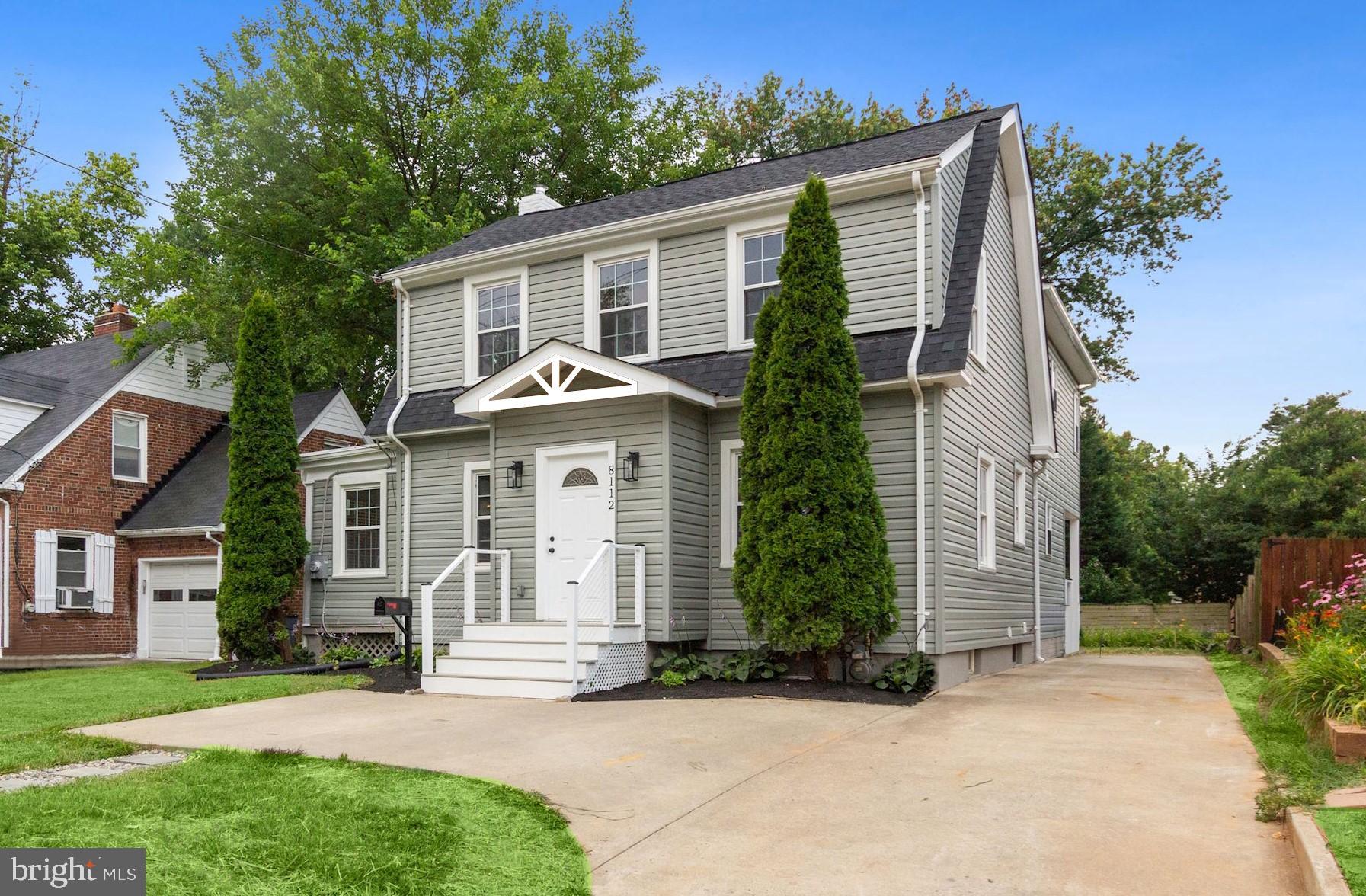 8112 Old Georgetown Road Bethesda, MD 20814 - Photo 1 of 51 front view of a house with a yard