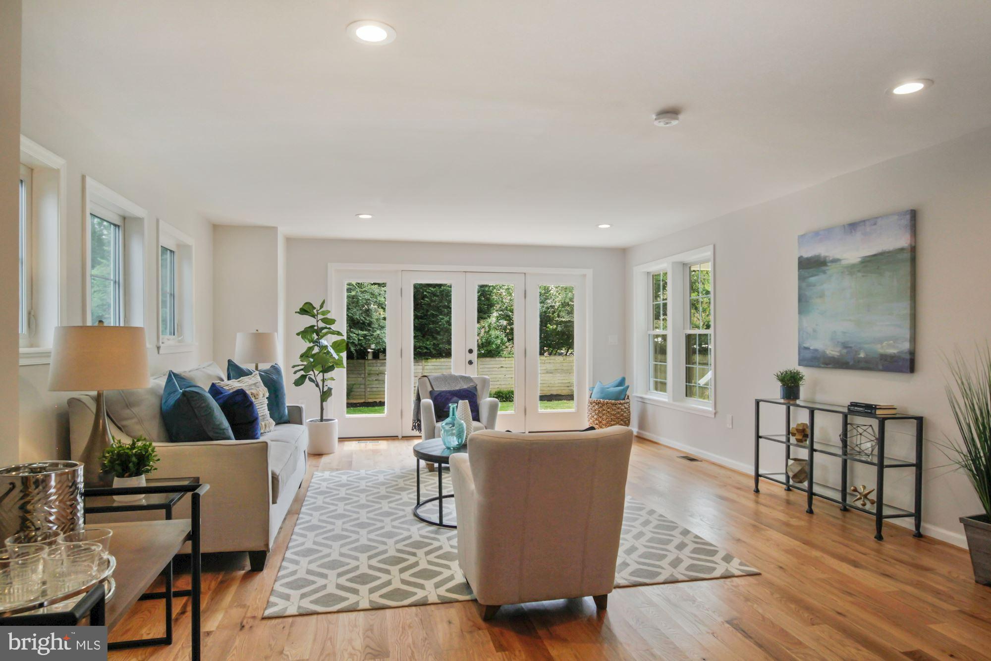 8112 Old Georgetown Road Bethesda, MD 20814 - Photo 3 of 51 a living room with furniture and a window