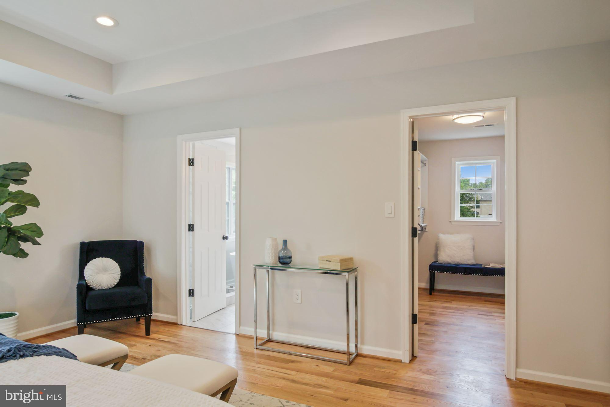 8112 Old Georgetown Road Bethesda, MD 20814 - Photo 23 of 51 a living room with furniture and a table