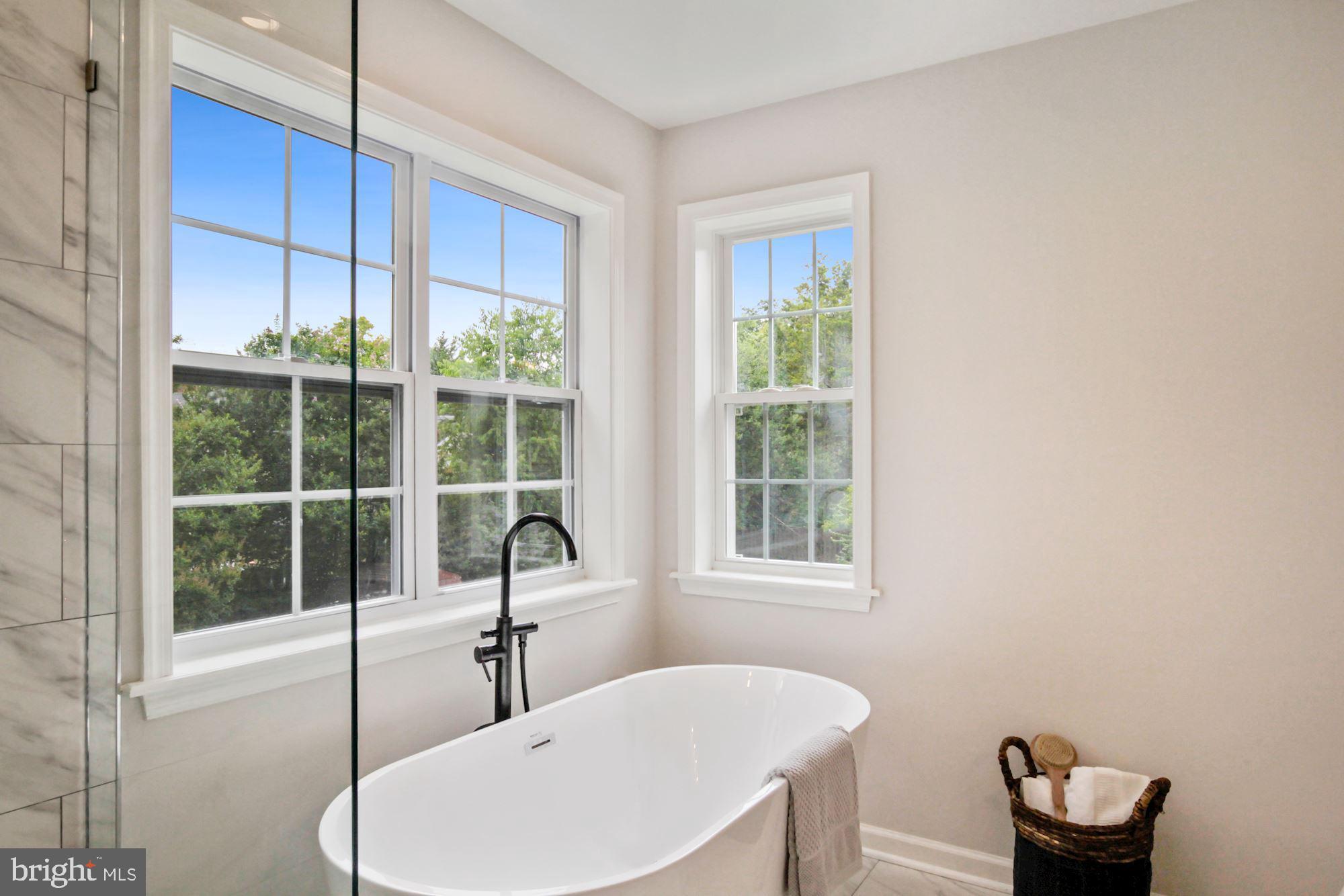 8112 Old Georgetown Road Bethesda, MD 20814 - Photo 26 of 51 a bathroom with a sink and a window