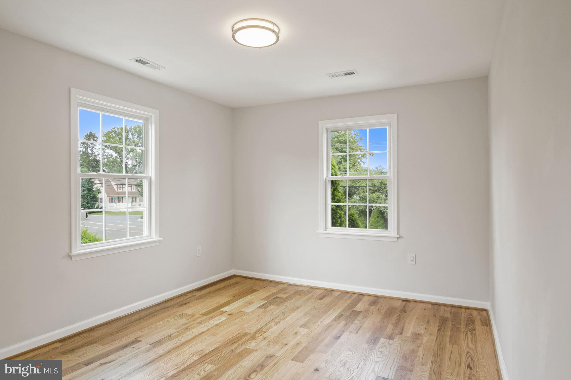 8112 Old Georgetown Road Bethesda, MD 20814 - Photo 28 of 51 an empty room with a window