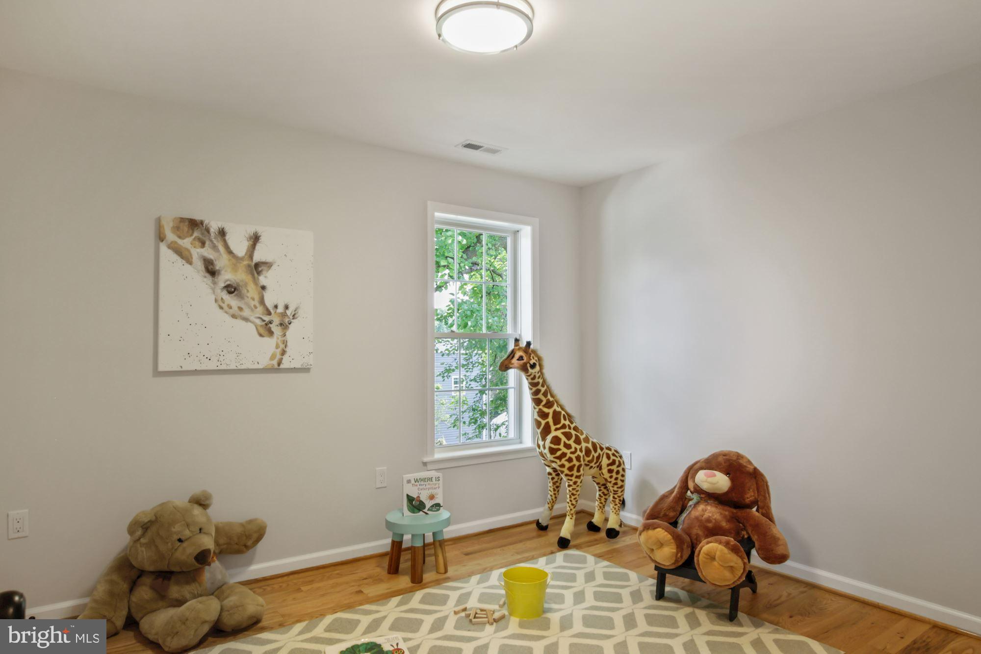 8112 Old Georgetown Road Bethesda, MD 20814 - Photo 32 of 51 a room with toys and a window