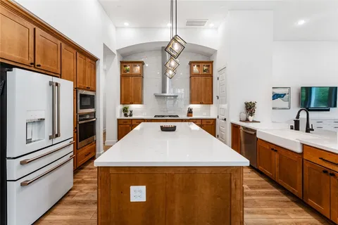 a bathroom with a sink double vanity and a mirror