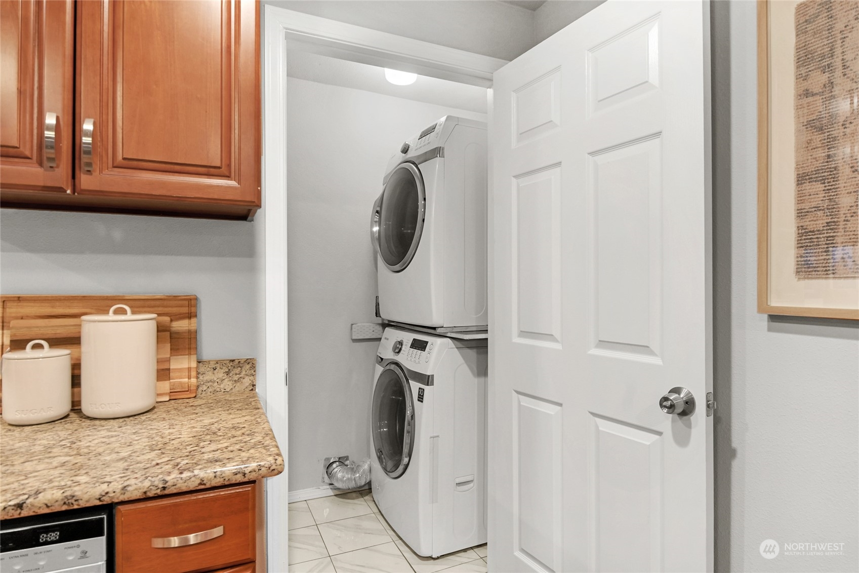 428 Southwest 124th Street Seattle, WA 98146 - Photo 13 of 28 a bathroom with a granite countertop sink and a mirror