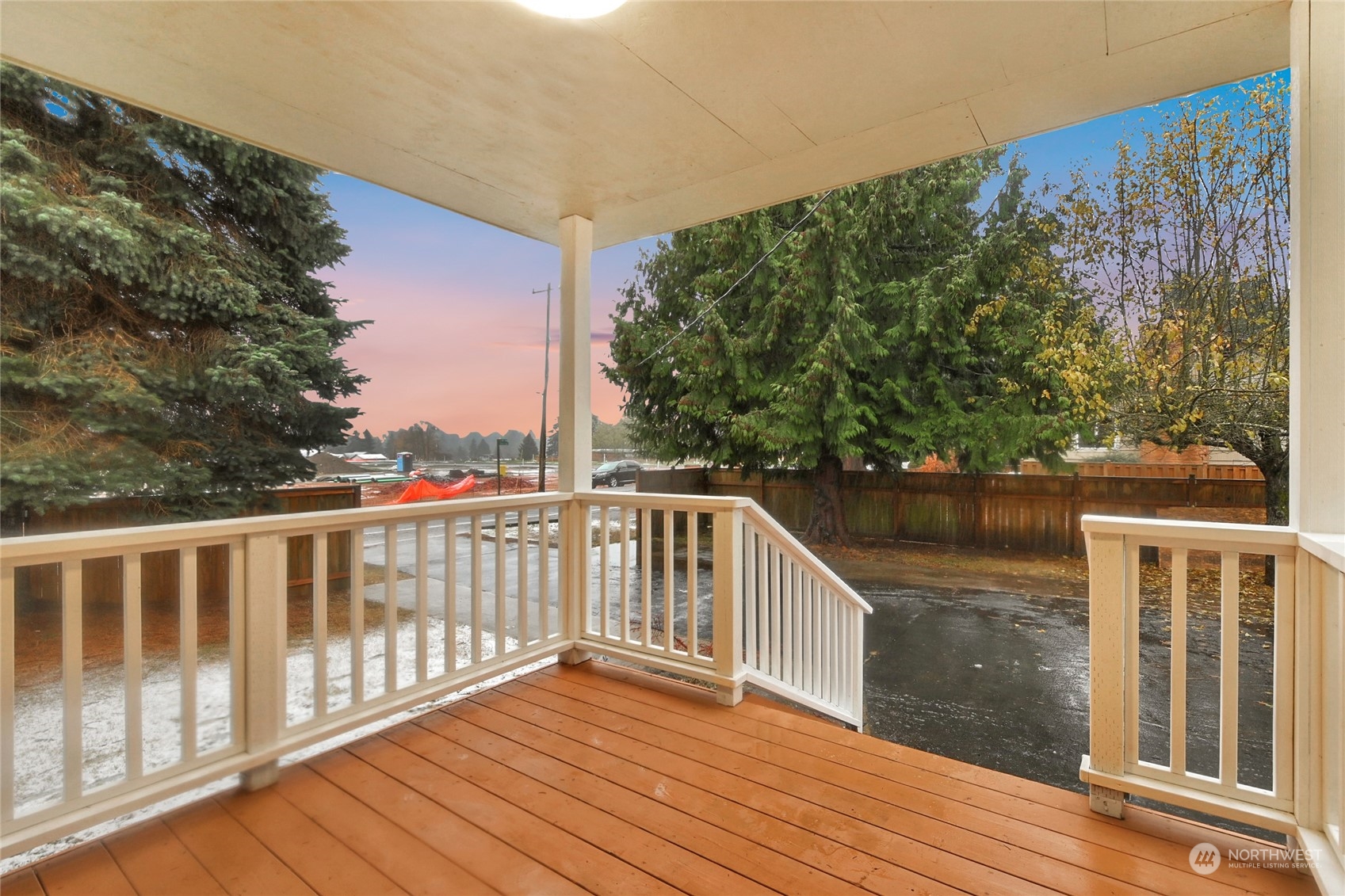 428 Southwest 124th Street Seattle, WA 98146 - Photo 3 of 28 a view of balcony with wooden floor and lake view