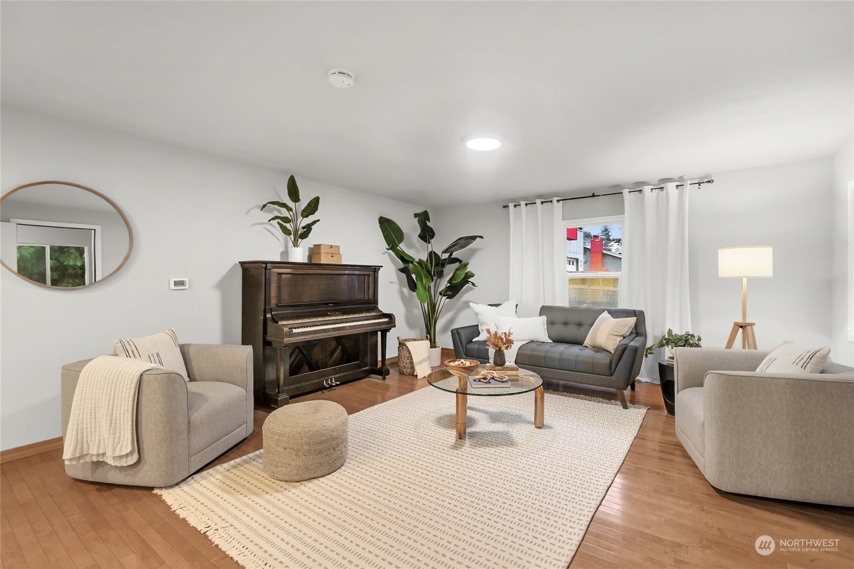 428 Southwest 124th Street Seattle, WA 98146 - Photo 6 of 28 a living room with furniture and wooden floor