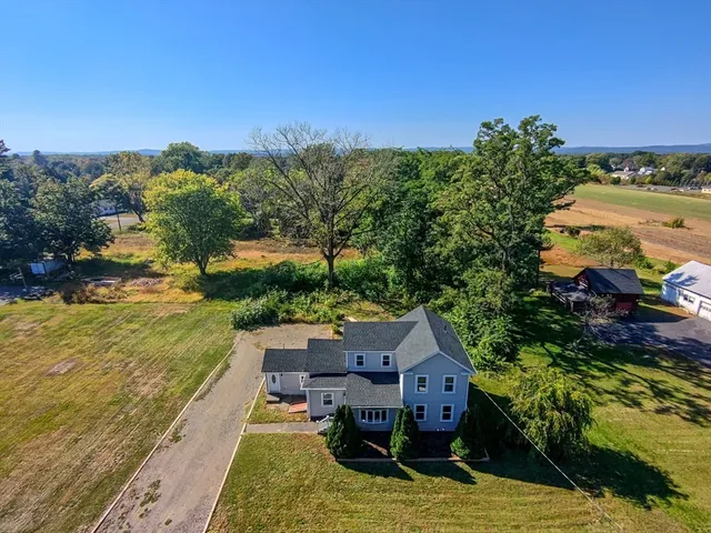 a view of a house with a ocean view