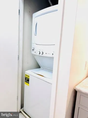 a kitchen with appliances and cabinets
