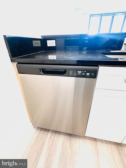 2120 Vermont Avenue Northwest, Unit 207 Washington, DC 20001 - Photo 19 of 32 a view of wooden cabinets