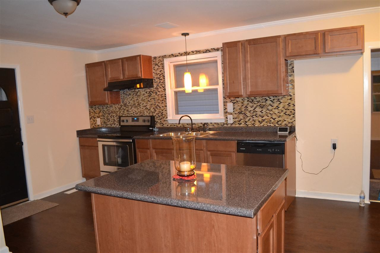 4623 Bragg Road Durham, NC 27704 - Photo 3 of 25 Kitchen was Renovated, lots of room to prep and cook Large Kitchen - New Stainless Appliances