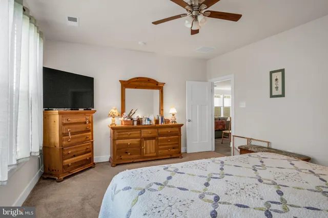 a bedroom with a bed and furniture