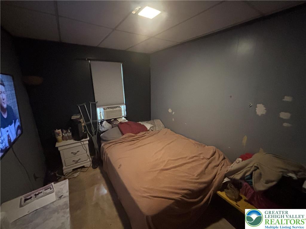3404 North Ruch Street Whitehall, PA 18052 - Photo 14 of 36 A window unit provides cooling in this naturally illuminated sleeping area.