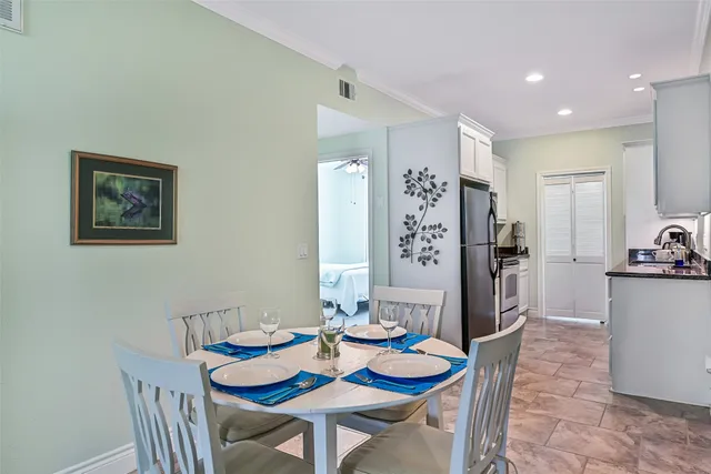 a view of a dining room with furniture