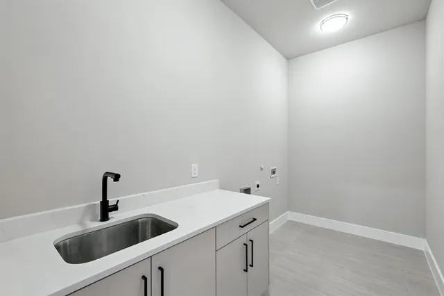 a view of a sink and dishwasher