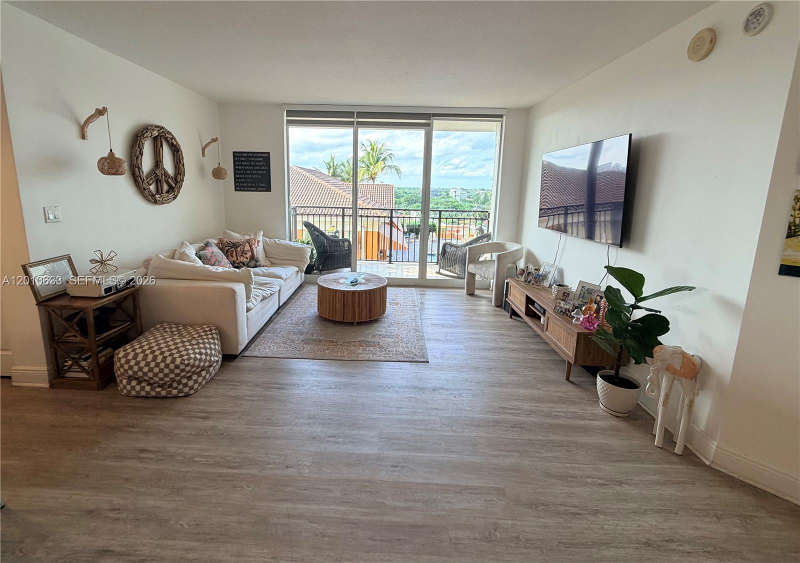 3232 Southwest 22nd Terrace, Unit 910 Miami, FL 33145 - Photo 2 of 31 a living room with furniture