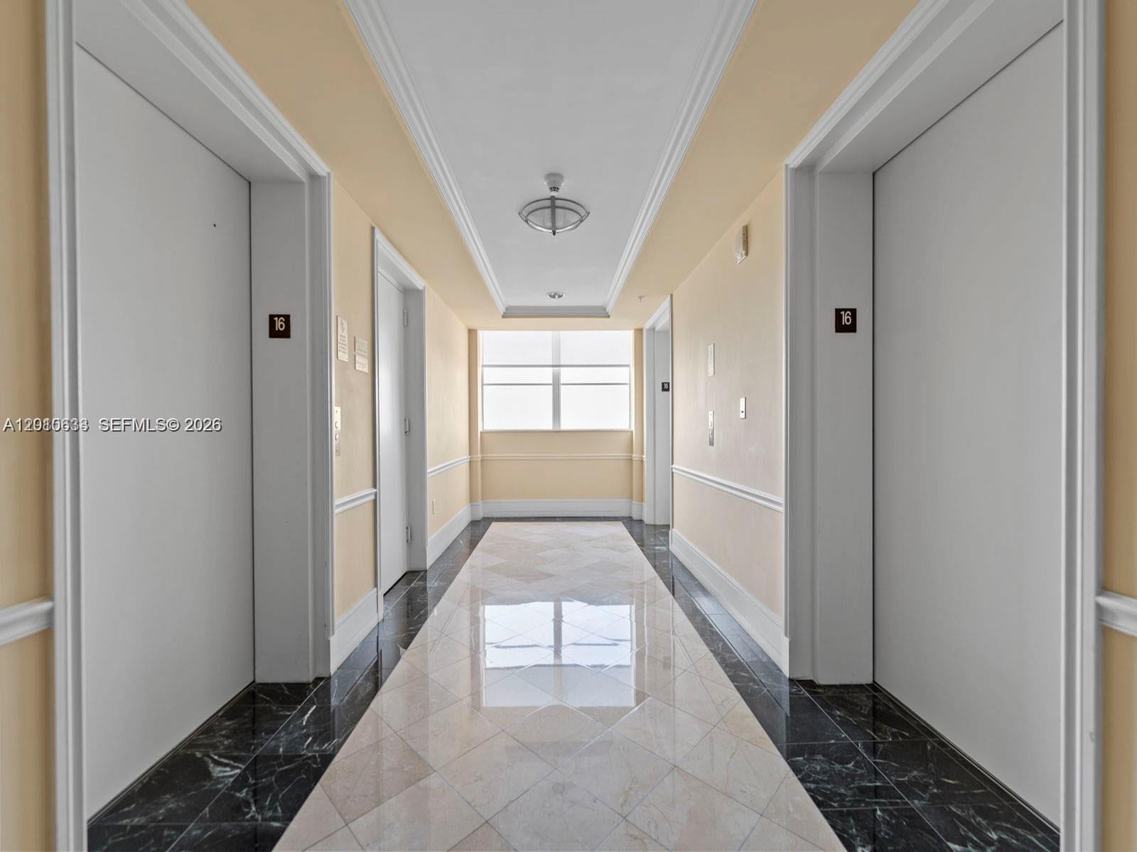 3232 Southwest 22nd Terrace, Unit 910 Miami, FL 33145 - Photo 21 of 31 a view of entryway with window