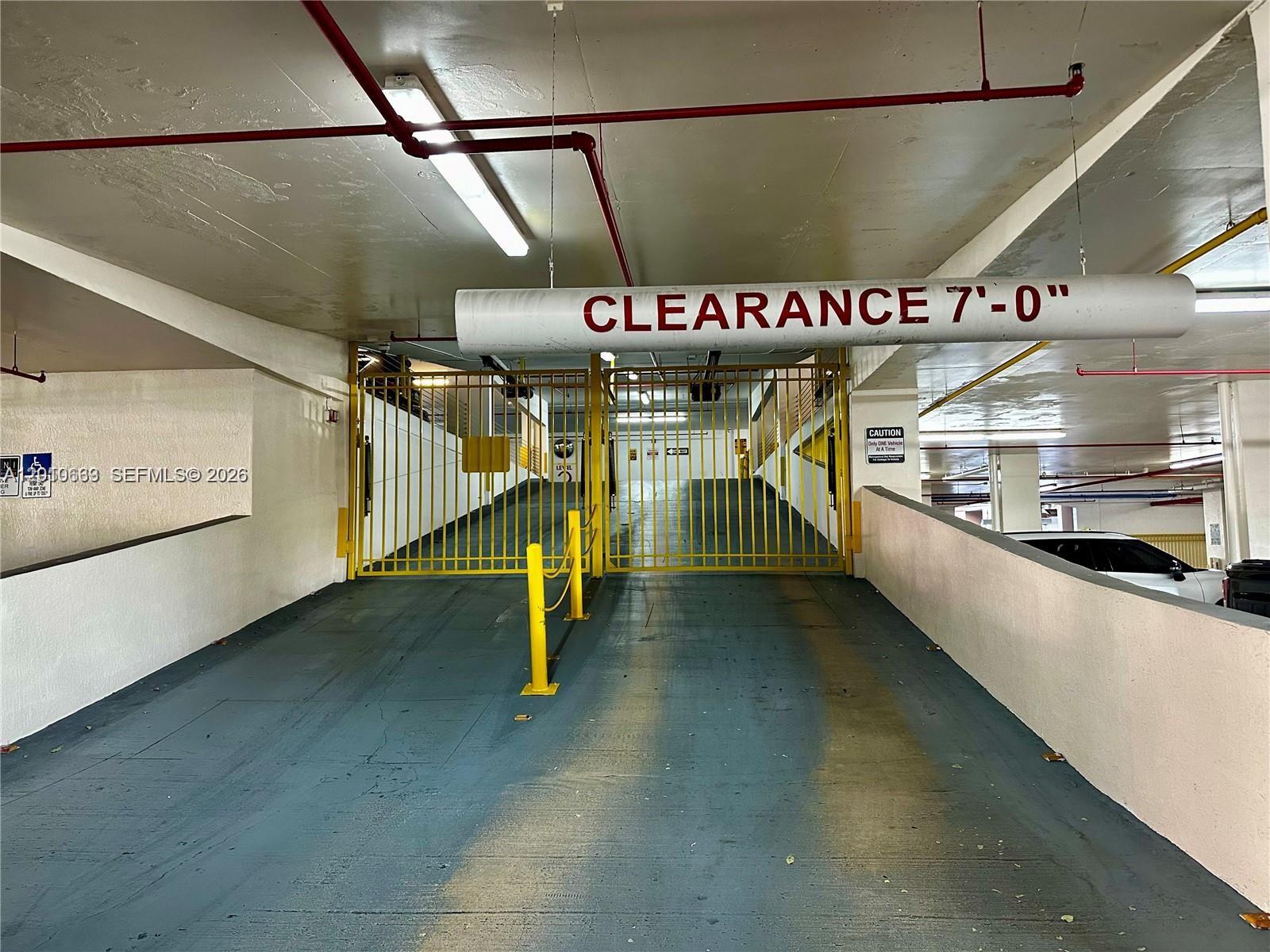 3232 Southwest 22nd Terrace, Unit 910 Miami, FL 33145 - Photo 25 of 31 a view of a indoor garage