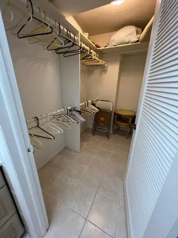 a utility room with chairs