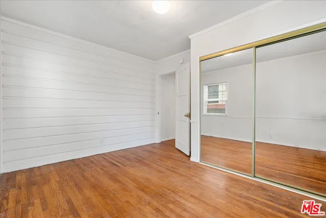 a view of balcony and wooden
