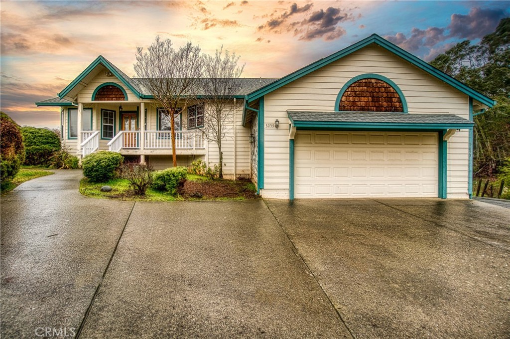 3253 Compton Avenue Lakeport, CA 95453 - Photo 1 of 38 a front view of a house with garden